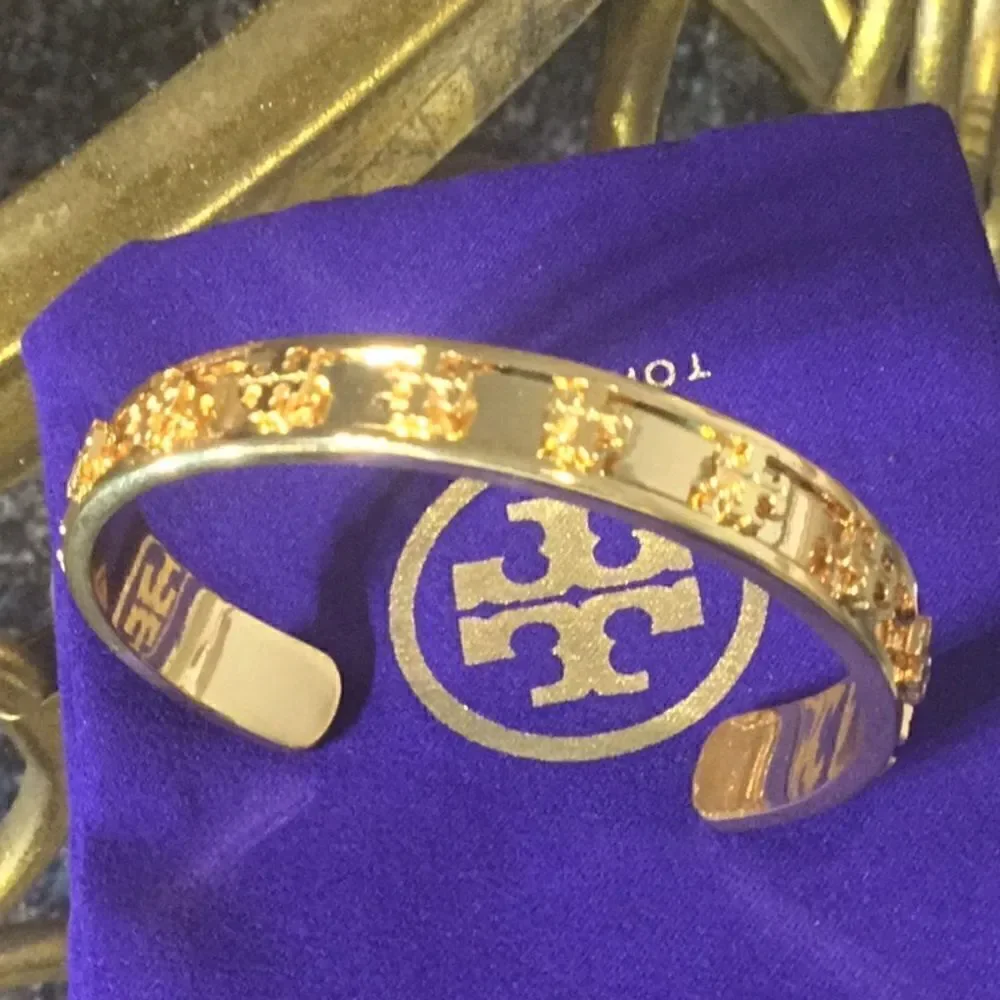 TORY BURCH RAISE LOGO STUDDED 18k GOLD PLATED BRACELET